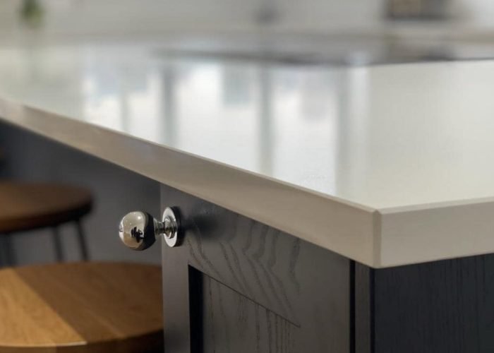 Save This for Later!This kitchen features Newmarket Light Grey & Indigo Blue painted doors with